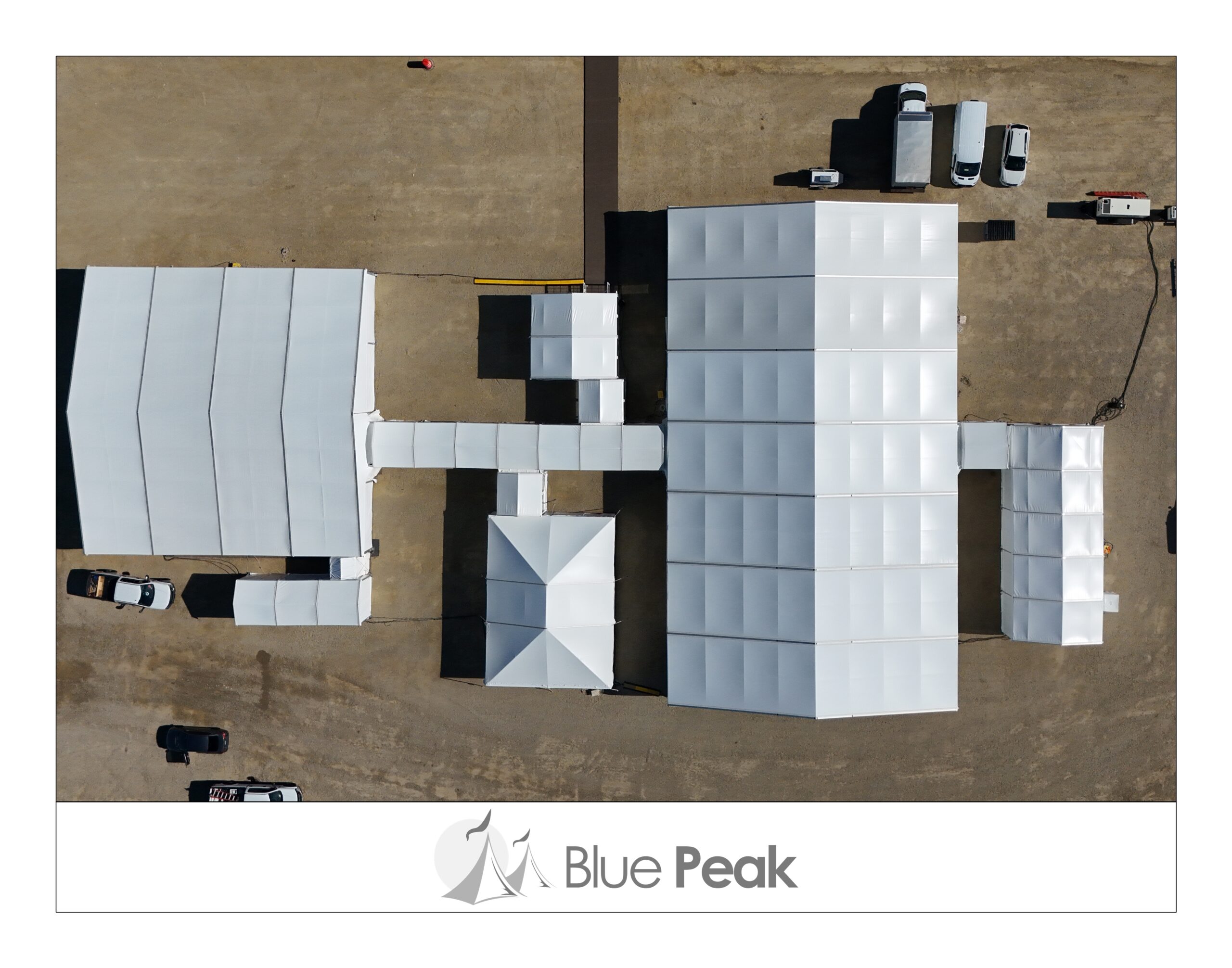 Industrial project for a commercial. This a drone image of the project site compiled of big and large structure tents for construction ground breaking ceremony.
