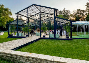Beautiful atrium tent photo facing the front entrance of the tent with custom luxury walkway.